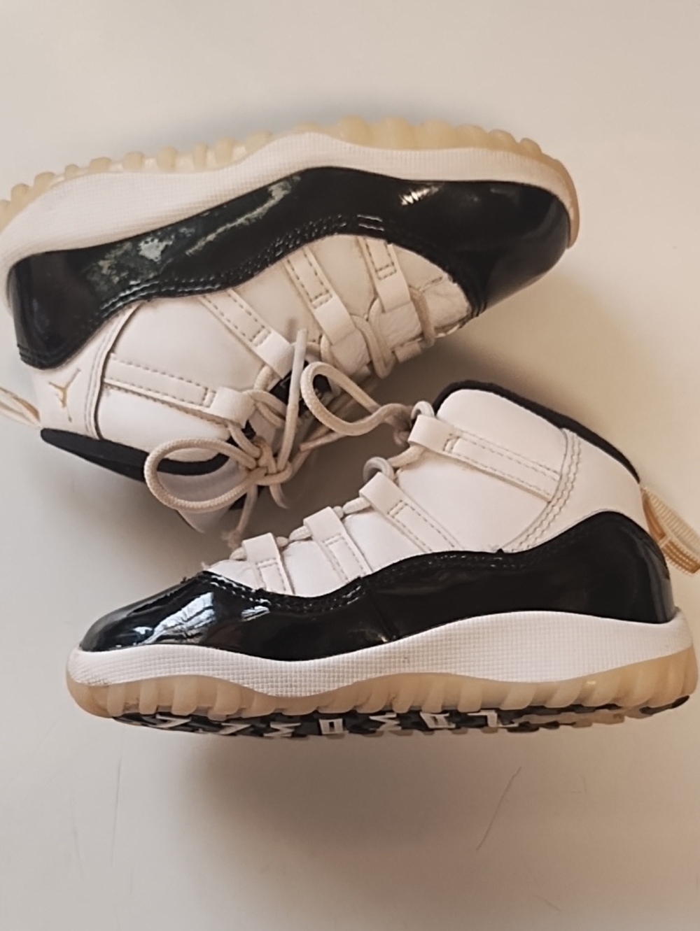 Jordan 11 Retro Gratitude| 8C | Black, White, Metallic Gold